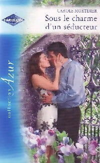Livrenpoche : Sous le charme d'un séducteur - Carole Mortimer, Marie-Pierre Malfait - Livre