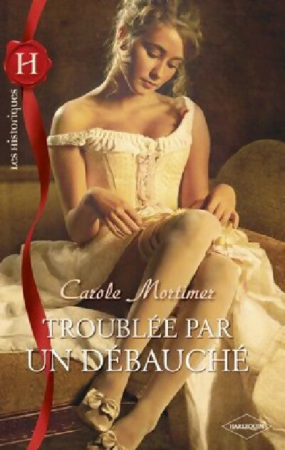 Livrenpoche : Troublée par un débauché - Carole Mortimer - Livre
