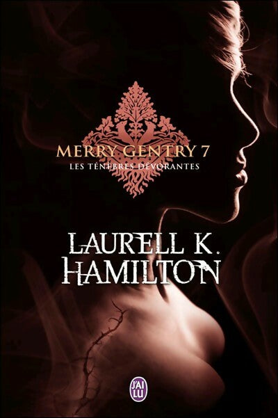 Merry Gentry Tome VII : Les ténèbres dévorantes - Laurell K. Hamilton - J'ai Lu - Livre