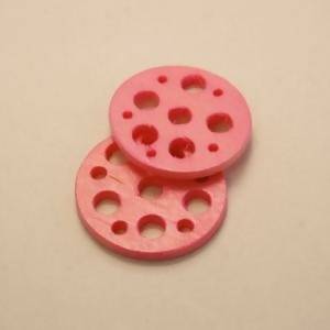 Disque perforé diamètre 25mm couleur rose (x 2)