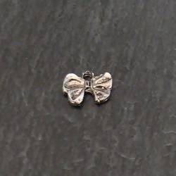 Perle en métal forme noeud papillon 10x8mm couleur argent vieilli (x 1)
