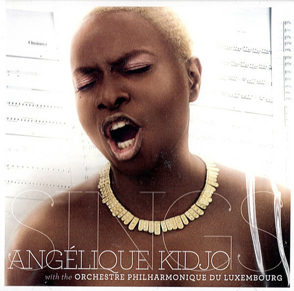 Livrenpoche : Angélique Kidjo With The Orchestre Philharmonique Du Luxembourg - Sings - Angélique Kidjo, The Orchestre Philharmonique Du Luxembourg - CD