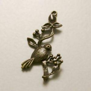 Perle en métal breloque oiseau sur branche 12x27mm couleur veil or (x 1)