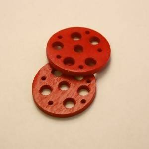 Disque perforé diamètre 25mm couleur rouge (x 2)